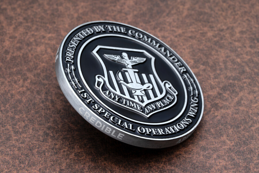 Challenge coin with edge engraving